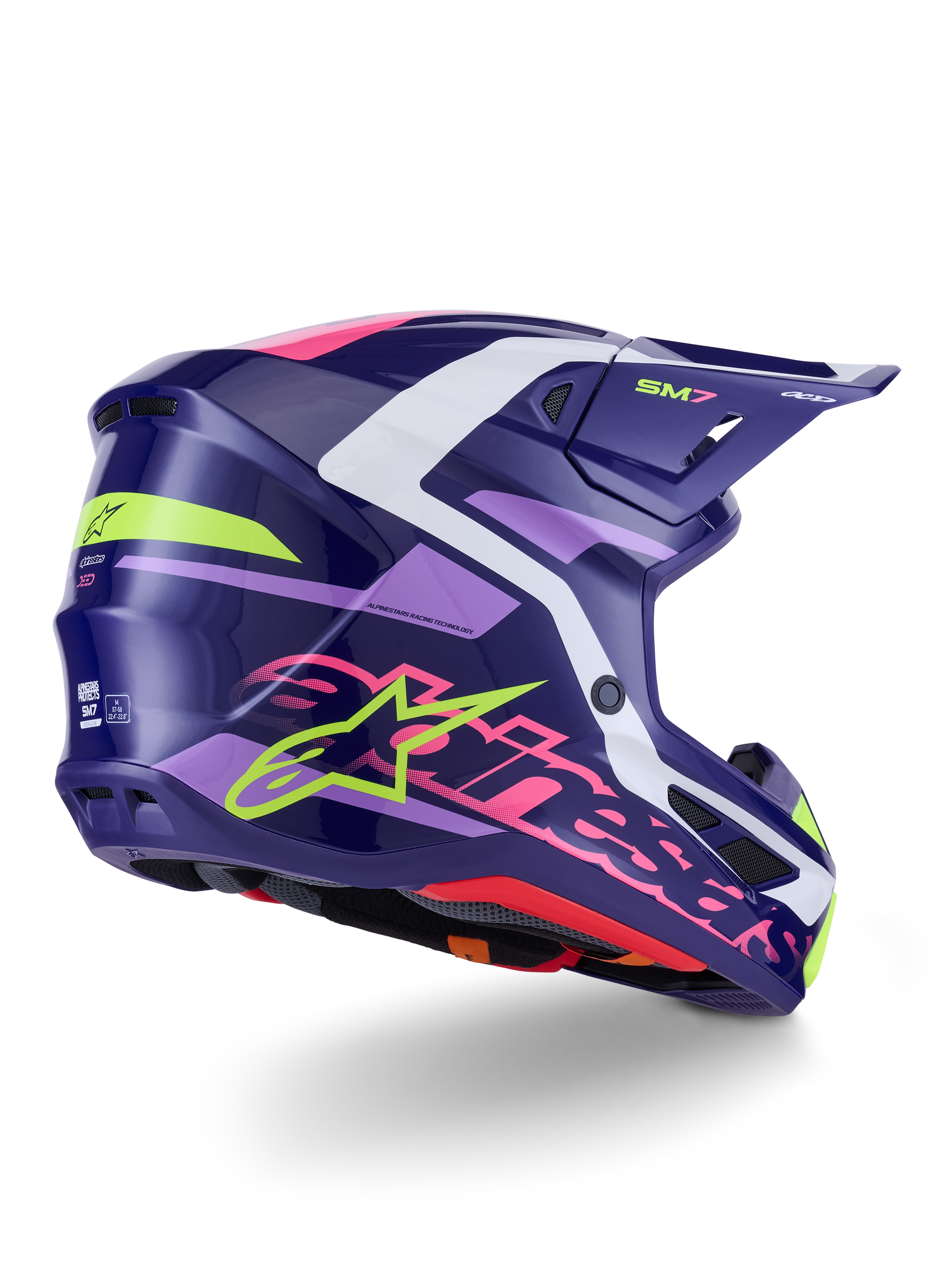 Alpinestars S-M7 Deed Helm, Motocross-Helm, Lila-Pink glänzend, Seiten-Rückansicht mit weißen und hellgrünen Akzenten, auffälliger pinkfarbener Alpinestars-Schriftzug und Stern-Logo, aerodynamisches Verbundschalendesign für Offroad-Performance