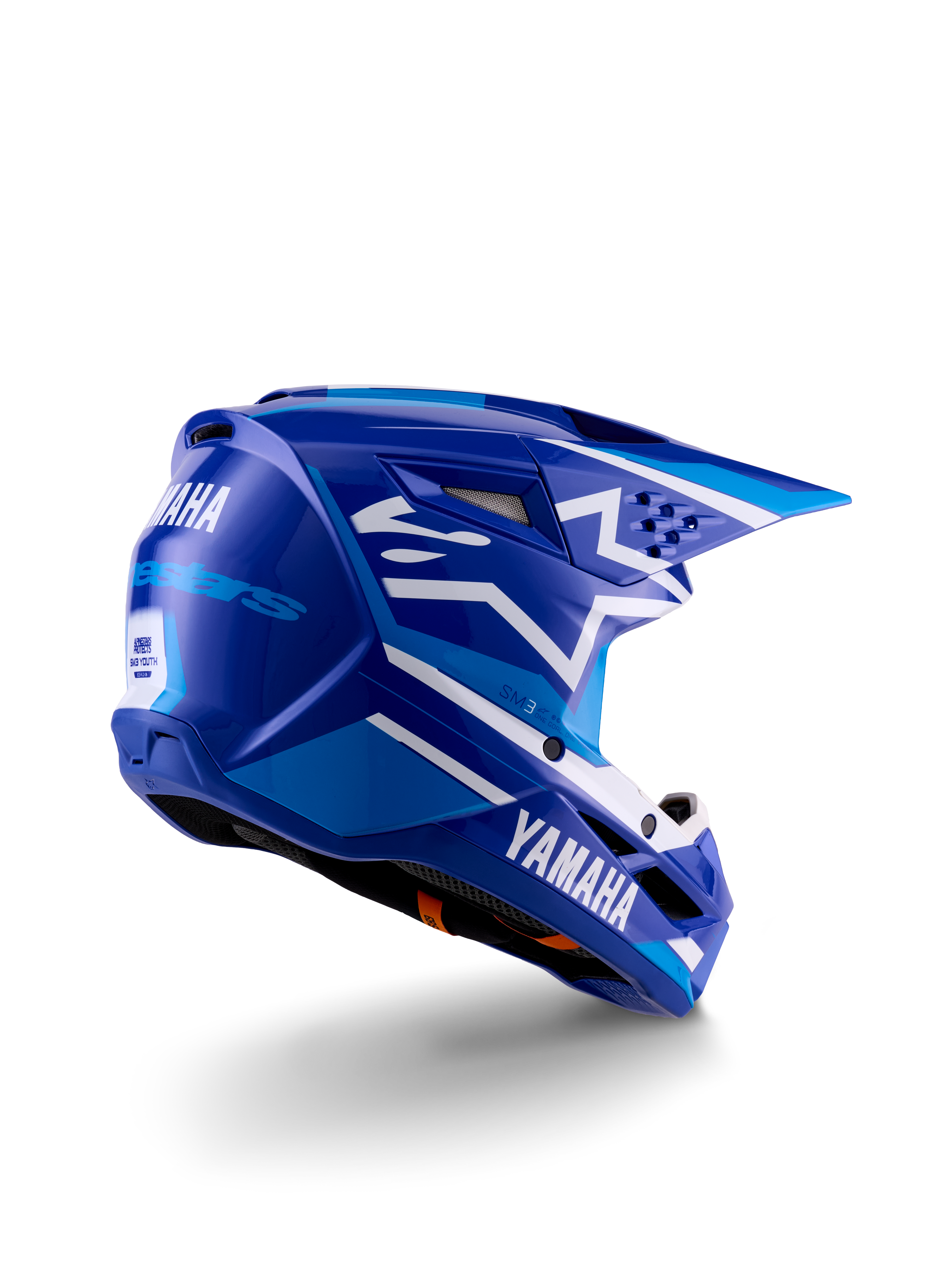 Alpinestars Yamaha S-M3 Jugend-Motocross-Helm, Blau und Weiß glänzend, mit markantem Yamaha-Branding an der Seite und Rückseite, aerodynamisches Schalendesign mit Belüftung hinten, jugendspezifischer Offroad-Kopfschutz in der Dreiviertel-Rückansicht