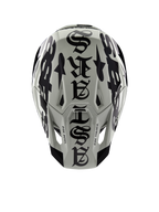 Alpinestars Limited Edition S-M7 Wolf Dust Helm, Draufsicht, glänzendes Finish in Dune und Schwarz, mit markanter Typografie im Gothic-Stil auf der Helmoberseite und „One Goal One Vision“-Details, professioneller Kopfschutz für den Motocross-Rennsport