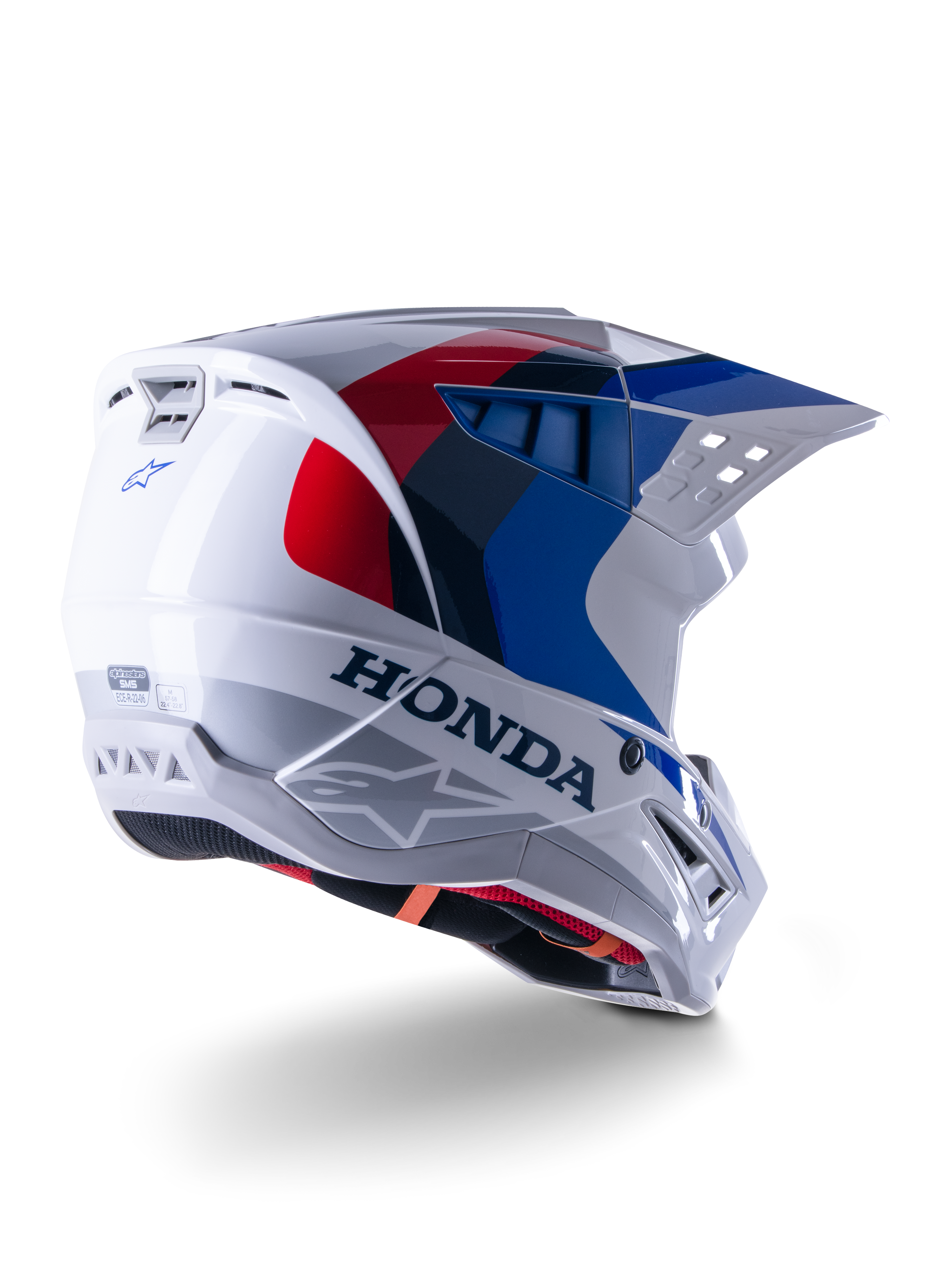 Alpinestars Honda S-M5 ECE Helm, Motocross-Helm, Weiß, Blau und Rot Glänzend, mit markantem Honda-Branding und Alpinestars-Logos, aerodynamische Schale mit integrierten Belüftungsöffnungen und verstellbarem Visier, Schutzausrüstung für den Offroad-Rennsport