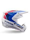 Alpinestars Honda S-M5 Helm ECE, Motocross-Helm, Weiß, Blau und Rot, Seitenprofil-Ansicht, aerodynamisches Design mit integriertem Visier, mehrere Belüftungsöffnungen, glänzendes Finish, markantes Honda-Branding und Alpinestars-Logo