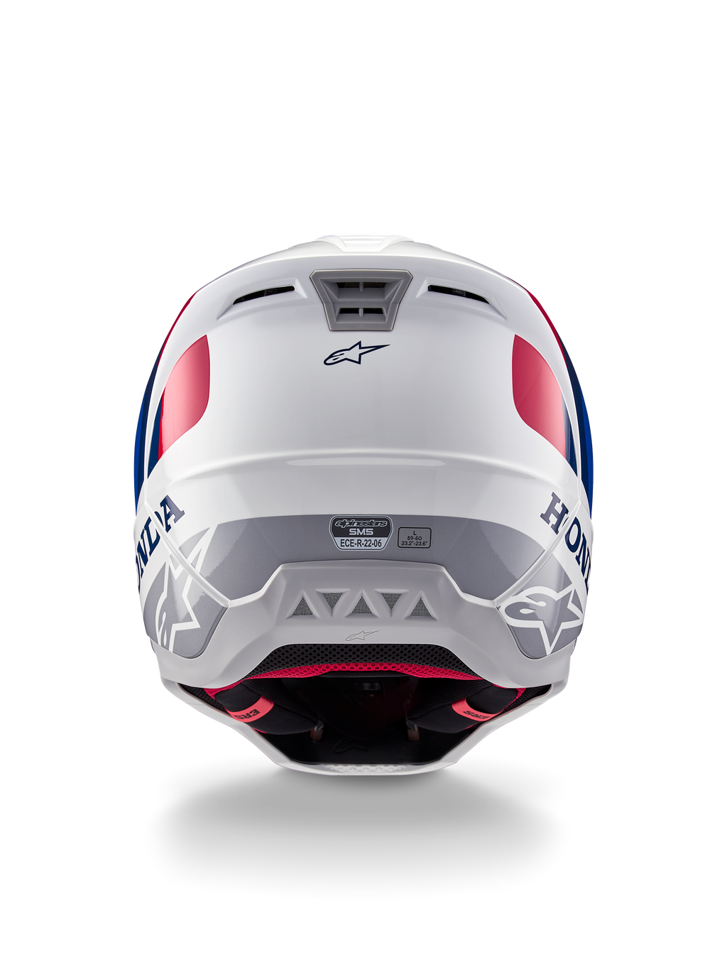 Alpinestars Honda S-M5 Helm ECE, Motocross-Helm, Weiß, Blau und Rot glänzend, Rückansicht mit Honda- und Alpinestars-Branding, schlanke Schale mit integrierten Belüftungsauslassöffnungen und ECE-Zertifizierungslabel.