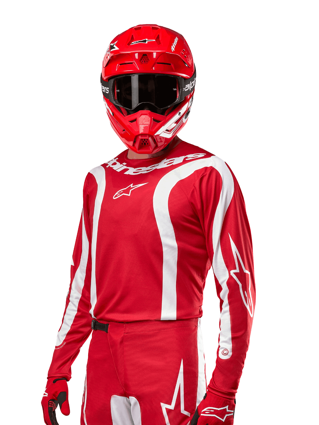 Alpinestars 2024 Fluid Lurv Trikot, Motocross-Renntrikot, Mars-Rot und Weiß, getragen mit passendem rotem Helm und Handschuhen, markantes sportliches Design mit weißen geschwungenen Streifen und Alpinestars-Branding