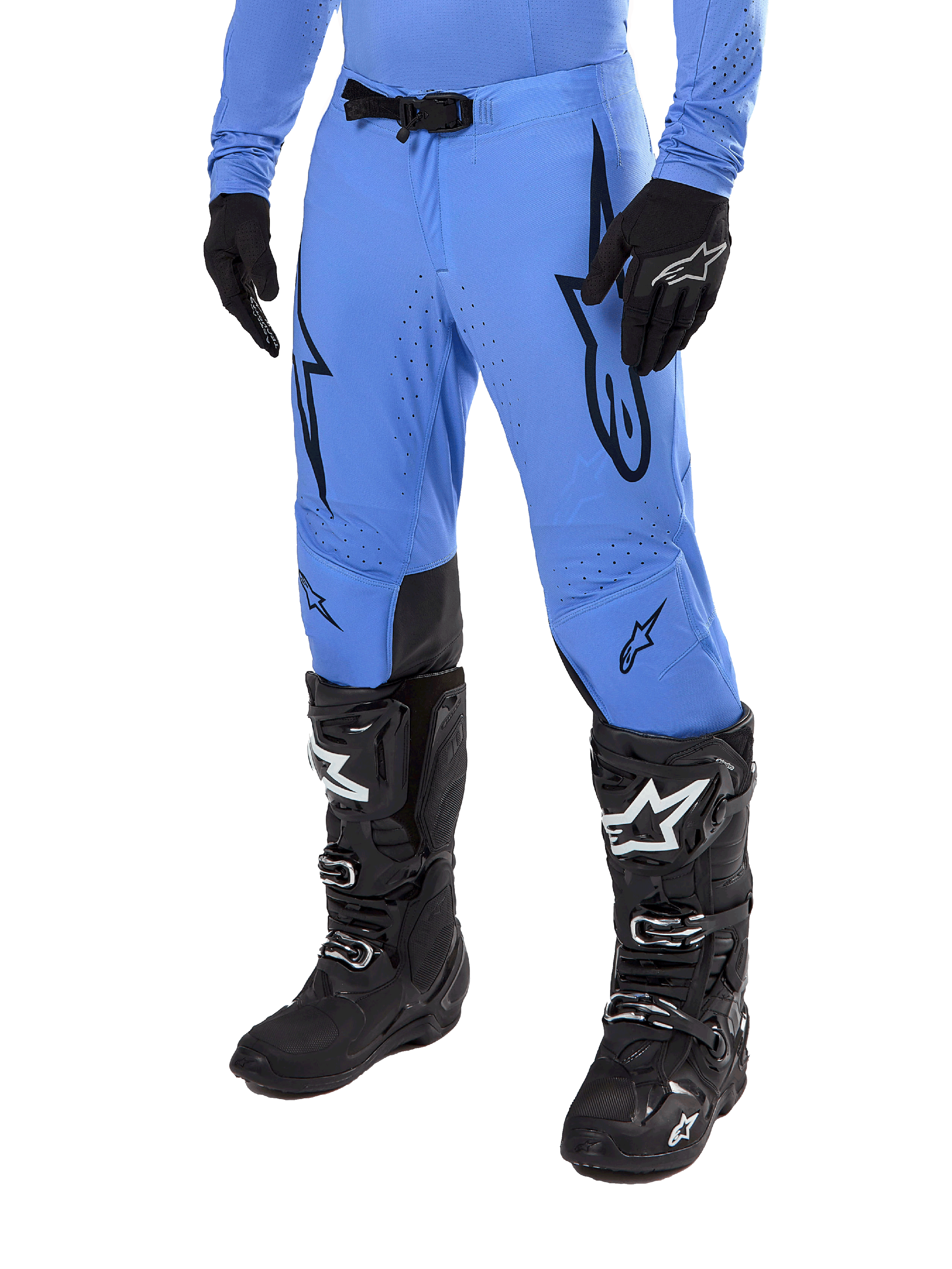 Alpinestars 2024 Supertech Dade Pants, Motocross Pants, Light Blue with black graphic logos, featuring ventilated perforations and a magnetic waist buckle, paired with black technical riding boots and gloves, professional off-road racing gear