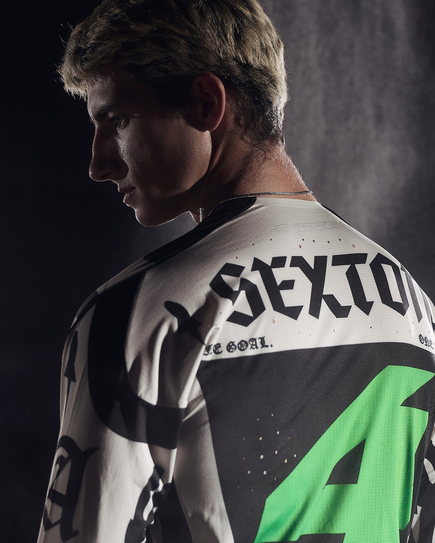 Alpinestars Limited Edition S-M7 Wolf Dust Helmet AND Visor, featuring a male rider in a black and green Sexton jersey.