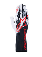 Alpinestars Tech-1 K V3 Handschuhe, Kart-Handschuhe, Schwarz Weiß Rot, mit schwarz-weiß gesprenkeltem Grafikdesign auf dem Handrücken, großem rotem Alpinestars-Logo, rotem Branding auf der langen Stulpe, professionelle Motorsportausrüstung