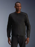 Male model wearing Alpinestars C-1 Air Jacket in Black, contemporary motorcycle jacket with extensive tech mesh panels and a full front zipper, paired with matching black riding pants, urban lifestyle and commuting aesthetic